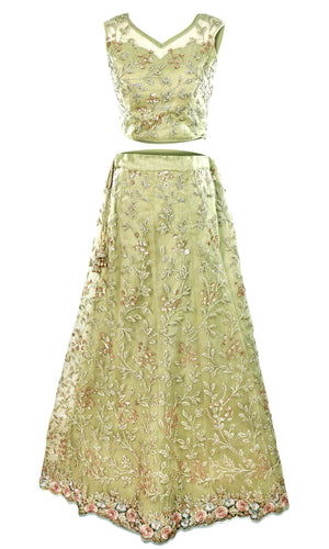 Green Lehenga and decked out bottom of the skirt and the border of the dupatta are fully covered in blue and pink flower embroidery.