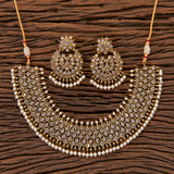 A Champagne Gold traditional jewelry, ivory 2 piece set: Necklace with earrings.