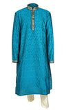 Bright blue and super silky kurta paired with a light beige pant