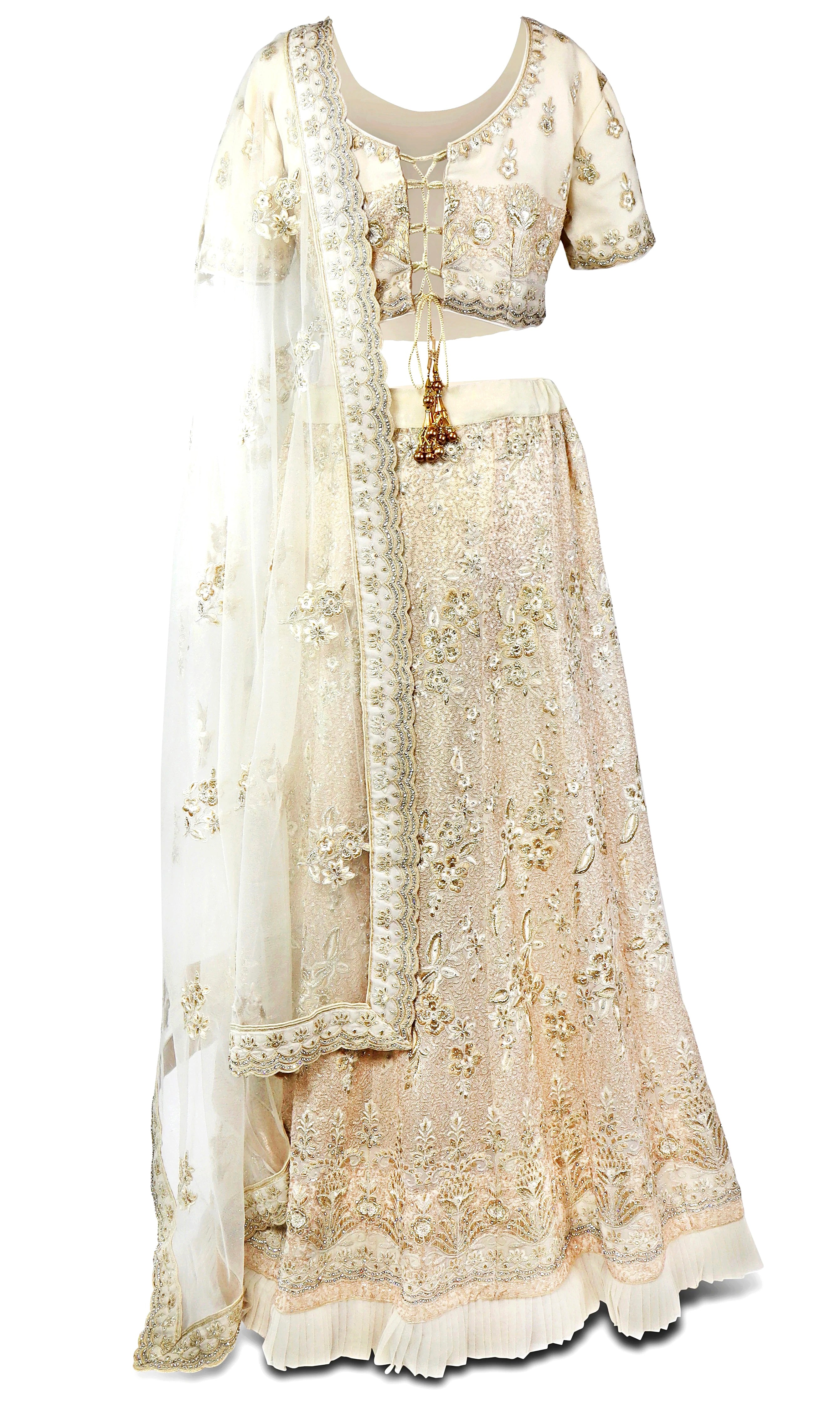 Creme shimmering colored lehenga covered in beautiful embroidery in shades of creme, off-white, gold and silver.