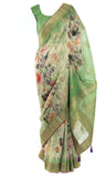 Breezy, Banarsari green Saree with stunning pink floral pattern all over & adjustable Blouse 