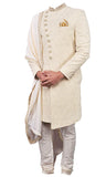 Indo-western style georgette creme/off-white colored sherwani Paired with a shimmery white pant