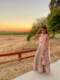 Gray silk lehenga with matching cream/peach plain blouse & pink dupatta lavished with pastel pink embroidery