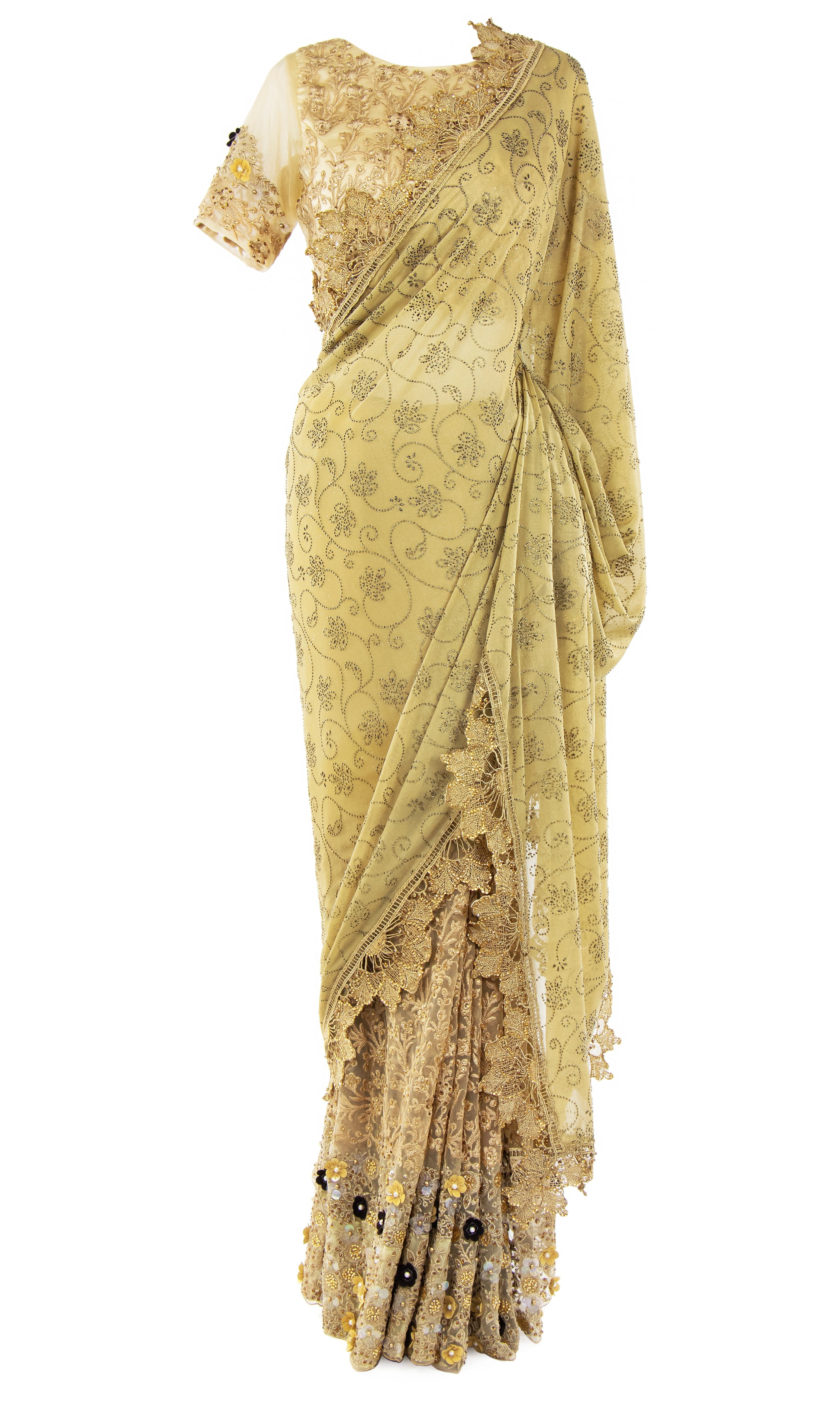 Stunning net blouse saree with moti work and embellished with 3D black and embroidered with gold beads is made.