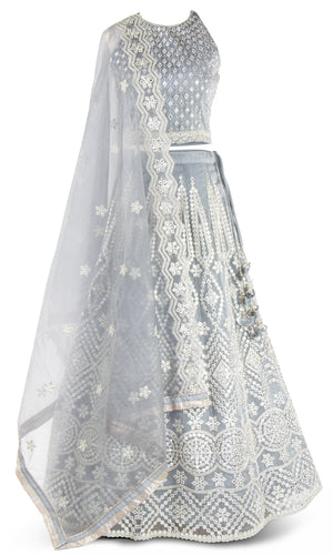 Gray organza lehenga paired with organza top & A-line skirt adorned with crystals.