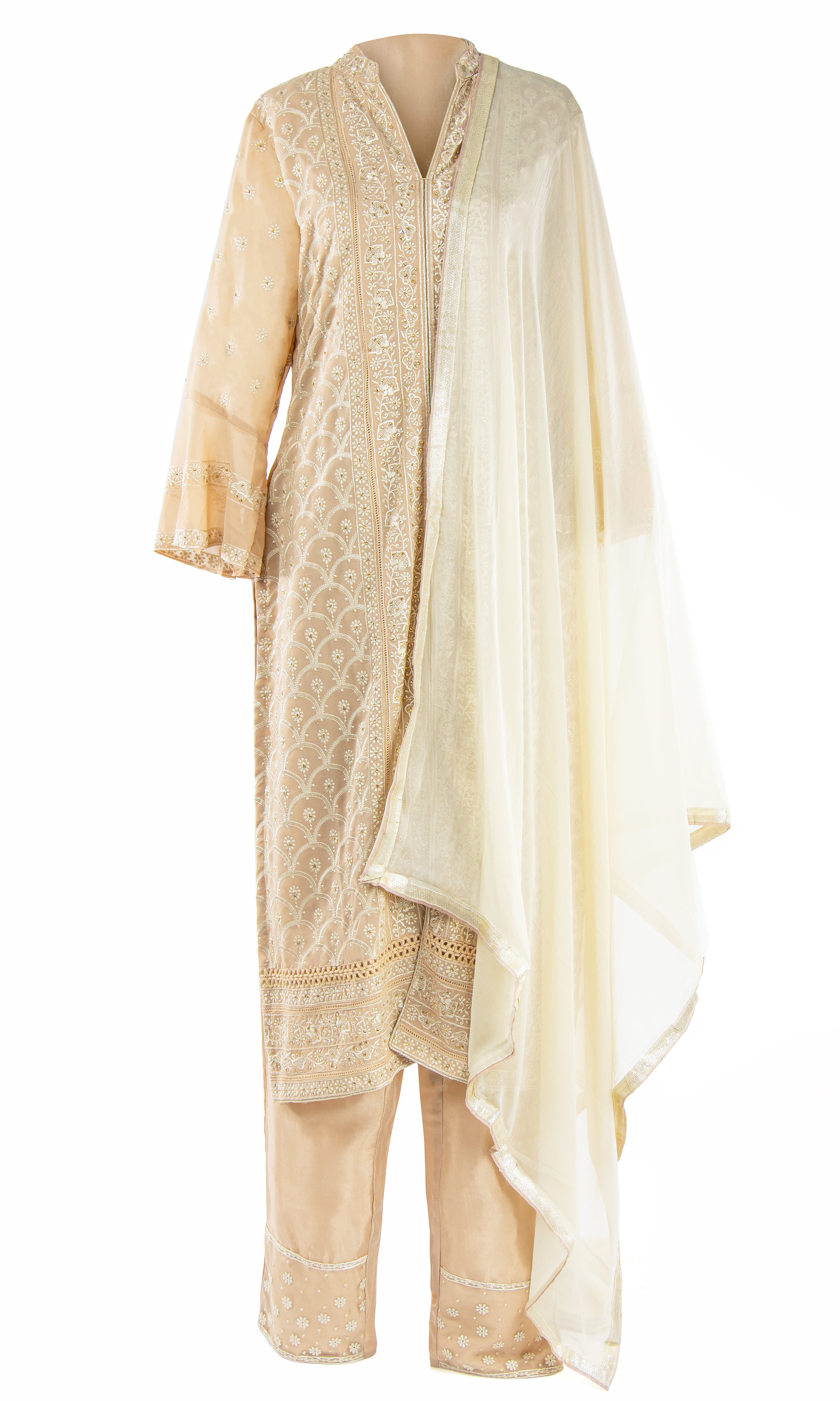 Gorgeous beige long sleeve kameez garnished with elegant cream threadwork paired with a palazzo pant