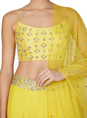 Matching tiered lehenga and a scallop dupatta and blouse, Designer: Izzumi Mehta