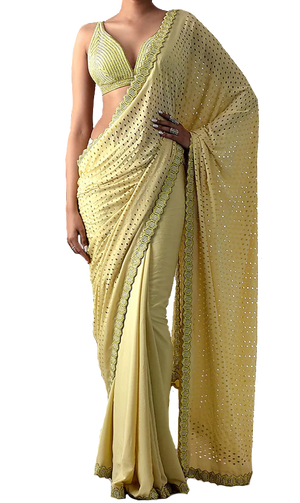 Pre-stitched citrus scalloped saree by Preeti S Kapoor & paired with a matching style sequined blouse.