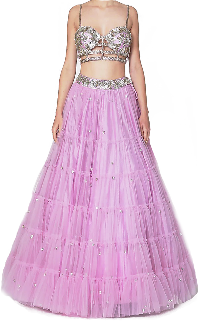 A beautiful lehenga is embroidered with silver sequins on a dupioni foundation and paired with a blouse.