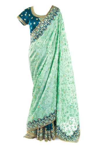 Sea green pre-stitched silk Saree with mint green and gold embroidery, & adjustable Blouse.