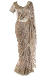 Saree is pre-pleated, matching petticoat is included. embroidered with stunning floral patterns.