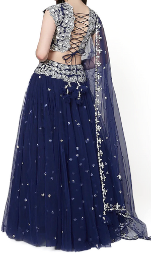 Midnight blue lehenga with blue blouse in dupion silk base with sequins embroidery.Designer: Preeti S Kapoor