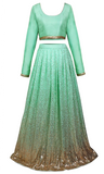 Sky blue Lehenga with pre- stitched blouse and has gold sequins embroidery ombre through-out the the skirt.