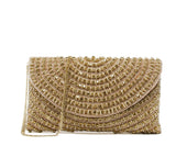 Sparkly champagne rose gold clutch Embroidered with beads, rhinestones, and crystals