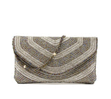 Multi-colored beaded twisting wristlet in Gold and silver clutch. fold-over snap closure.