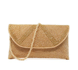 Gold clutch with Rose gold beaded twisting wristlet, fold-over snap closure.