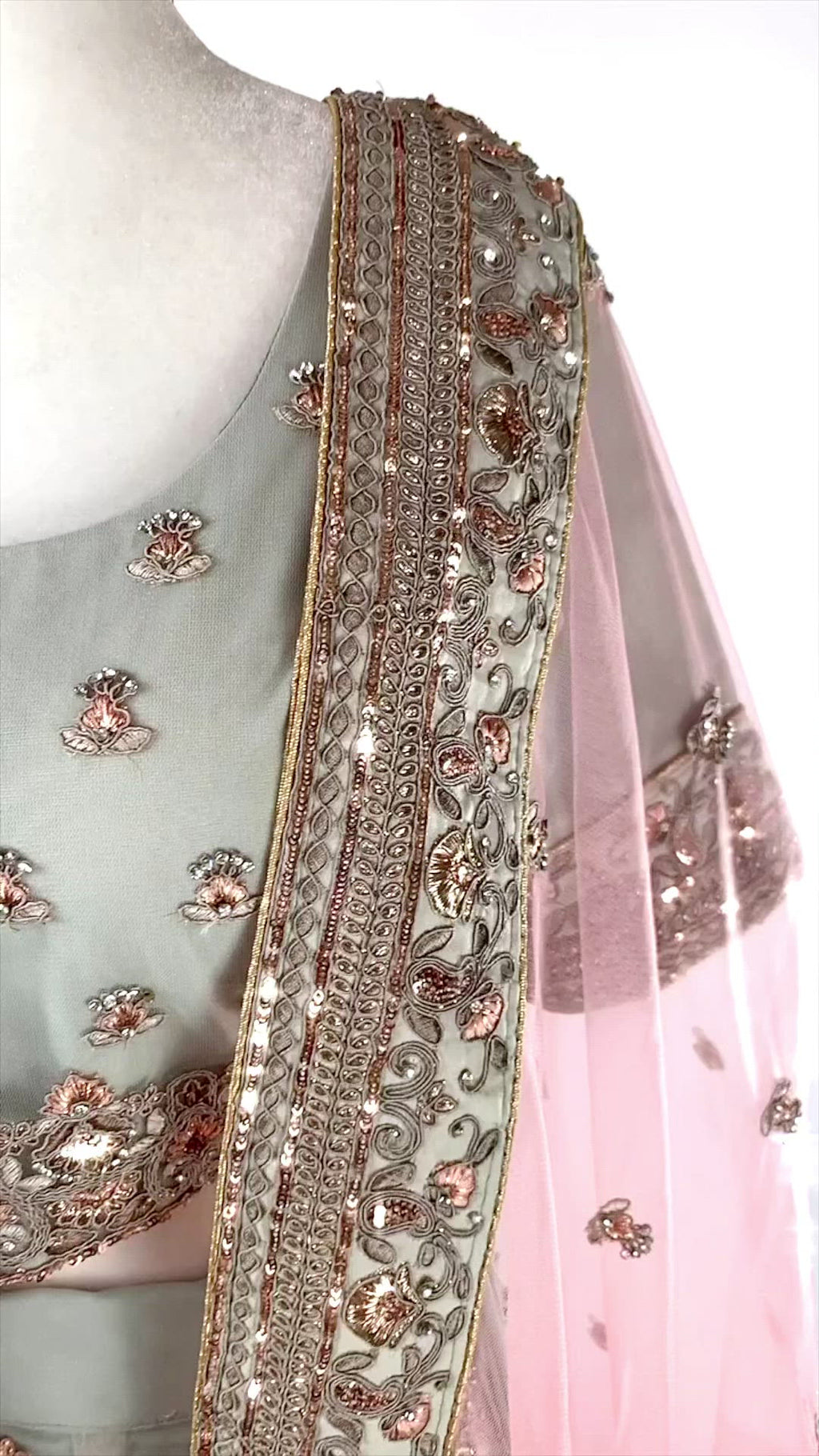 Pink embroidered Gray silk lehenga paired with a matching top and the perfect pink dupatta