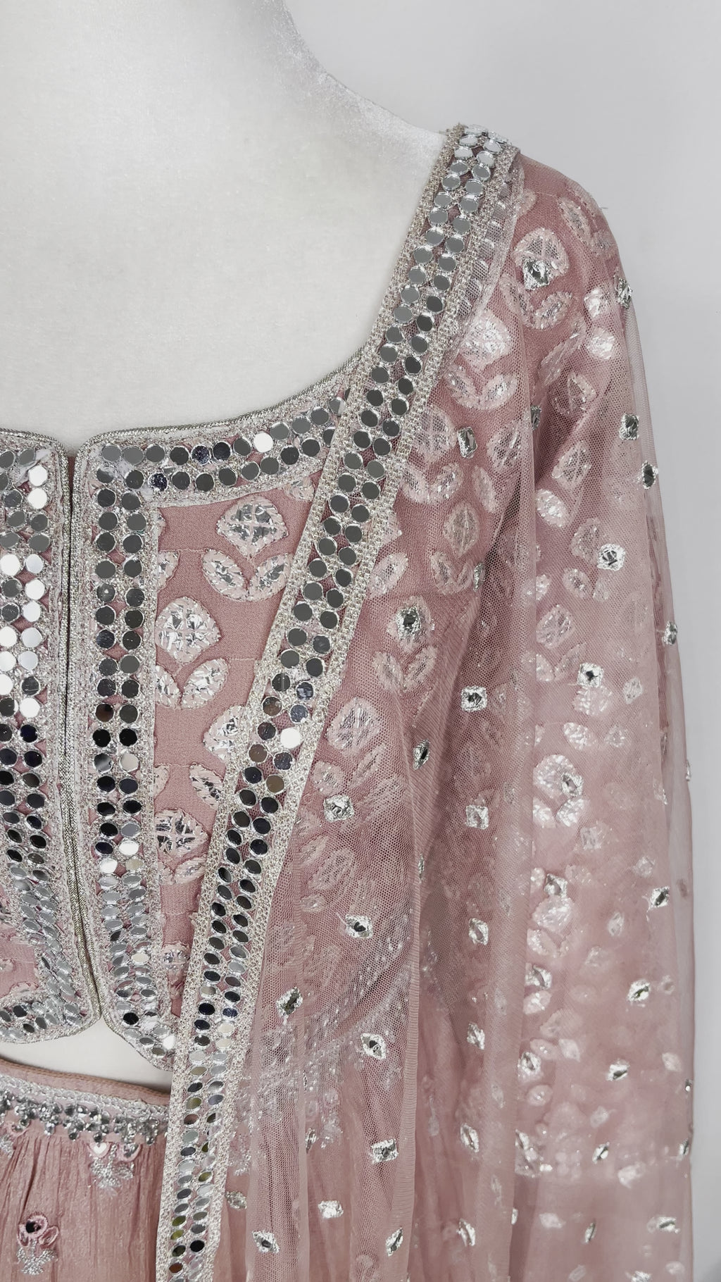 Stunning 3-piece burnt piece lehenga with silver mirror work with net dupatta