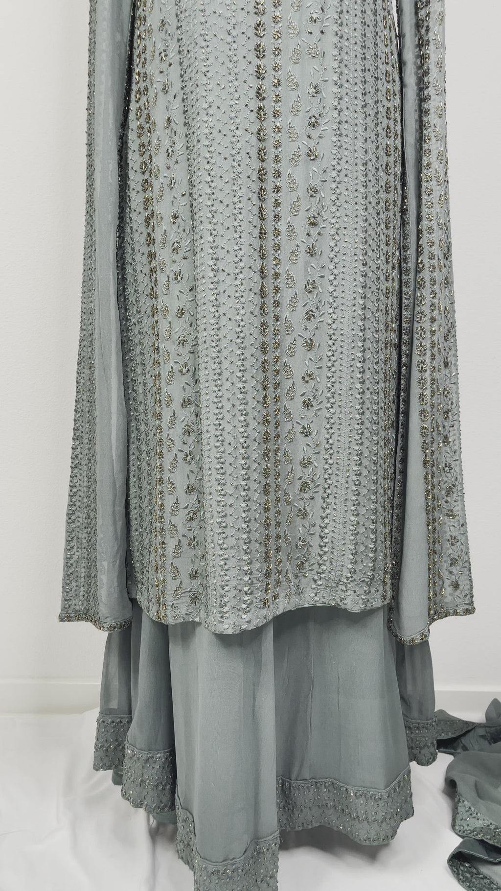 Gray/blue lehenga has long bat-style hanging sleeve,intricate embroidery blouse & Dupatta with beadwork 