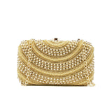 Ivory and gold clutch heavily embroidered with inside pocket