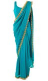 Simple, elegant, and eye-catching cyan colored saree with gold embroidered borders.