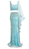 Light blue mermaid-style lehenga by Sherri Hill covered in shimmering silver beads
