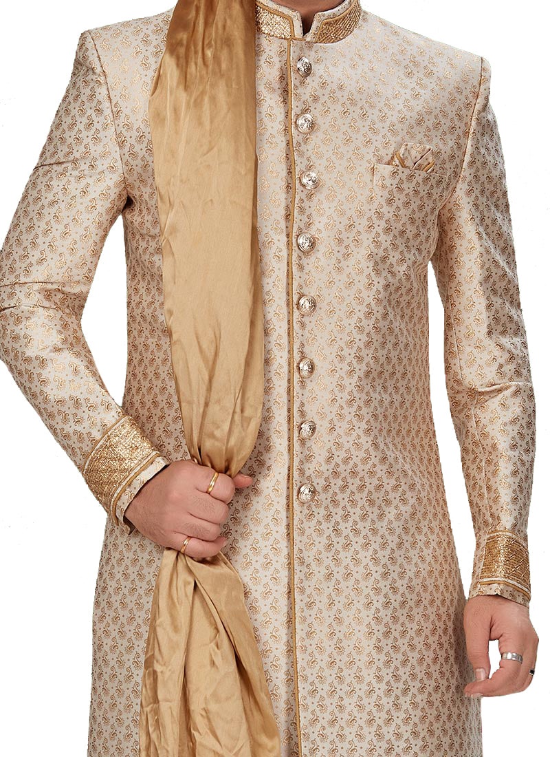 Gold silk Sherwani suit with collar, cuffs covered in gold & brown thread-work, & with matching gold pants