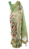 Breezy, Banarsari green Saree with stunning pink floral pattern & sleeveless blouse