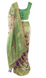 Breezy, Banarsari green Saree with stunning pink floral pattern all over & has a matching petticoat