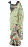Olive silk Saree embroidered with gray silk top and intricate gold cuffs