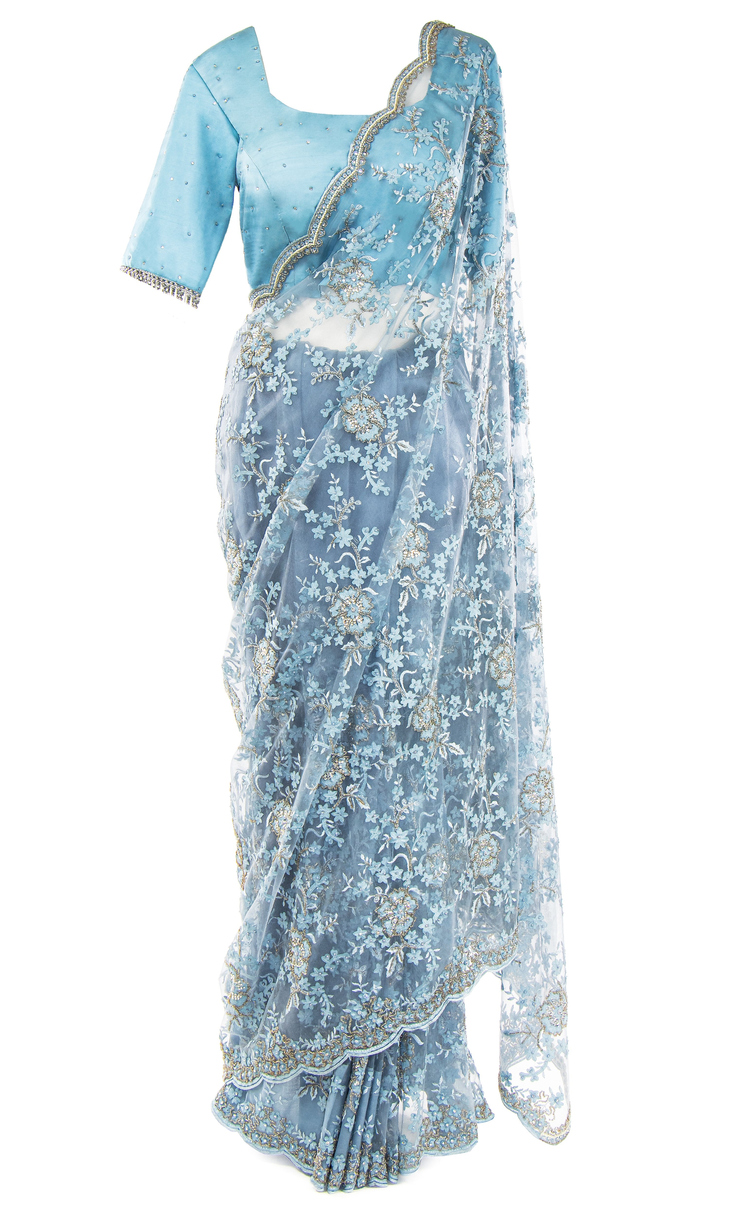 Lacy net Saree embellished with beaded blue and silver florals paired with pale blue silk top.