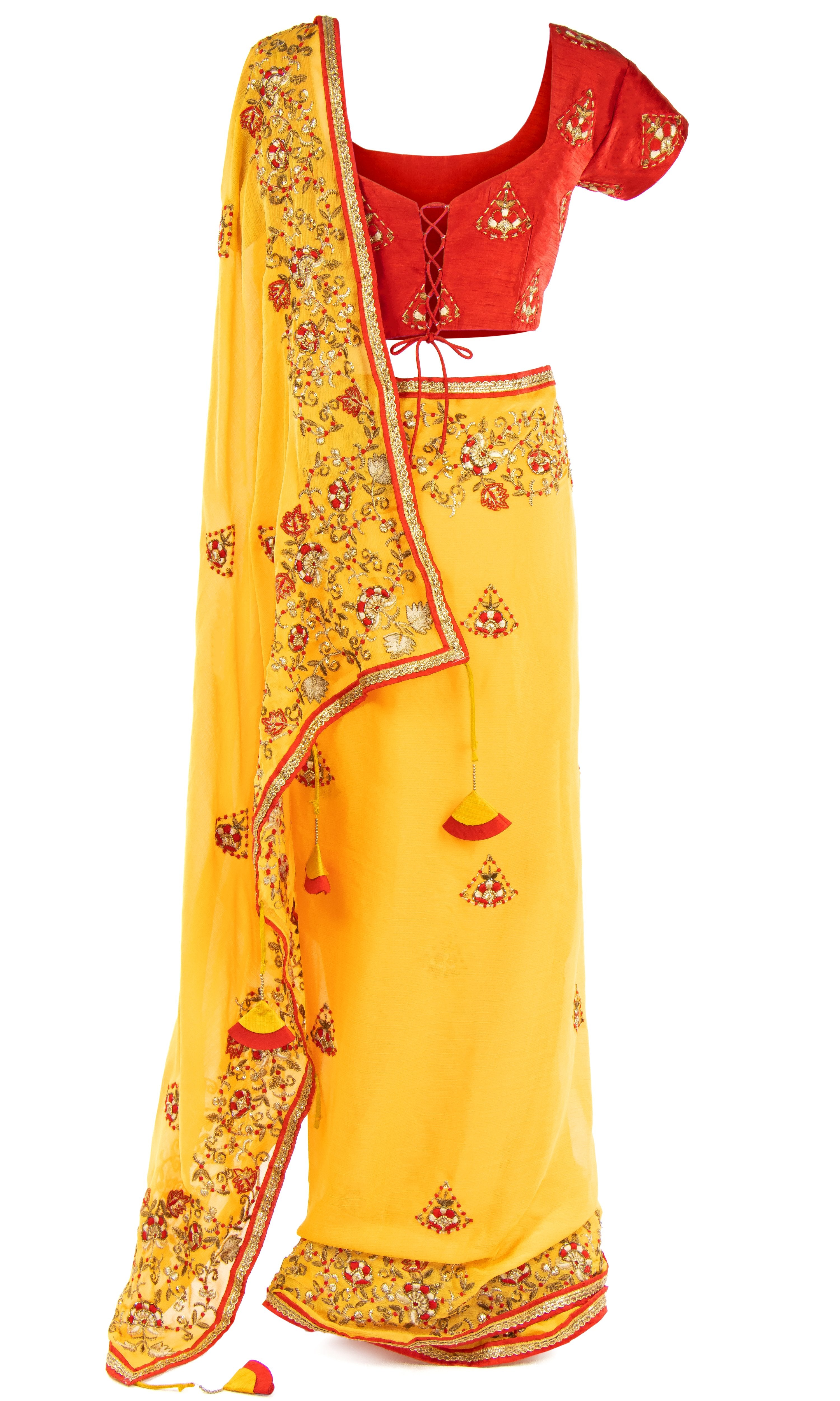 Yellow Chiffon Saree with Matching petticoat is included. The classic red blouse has the sweetest touch of Zari work on the sleeves.