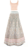 Gray silk lehenga with pastel pink embroidery and garnished with infinite crystals