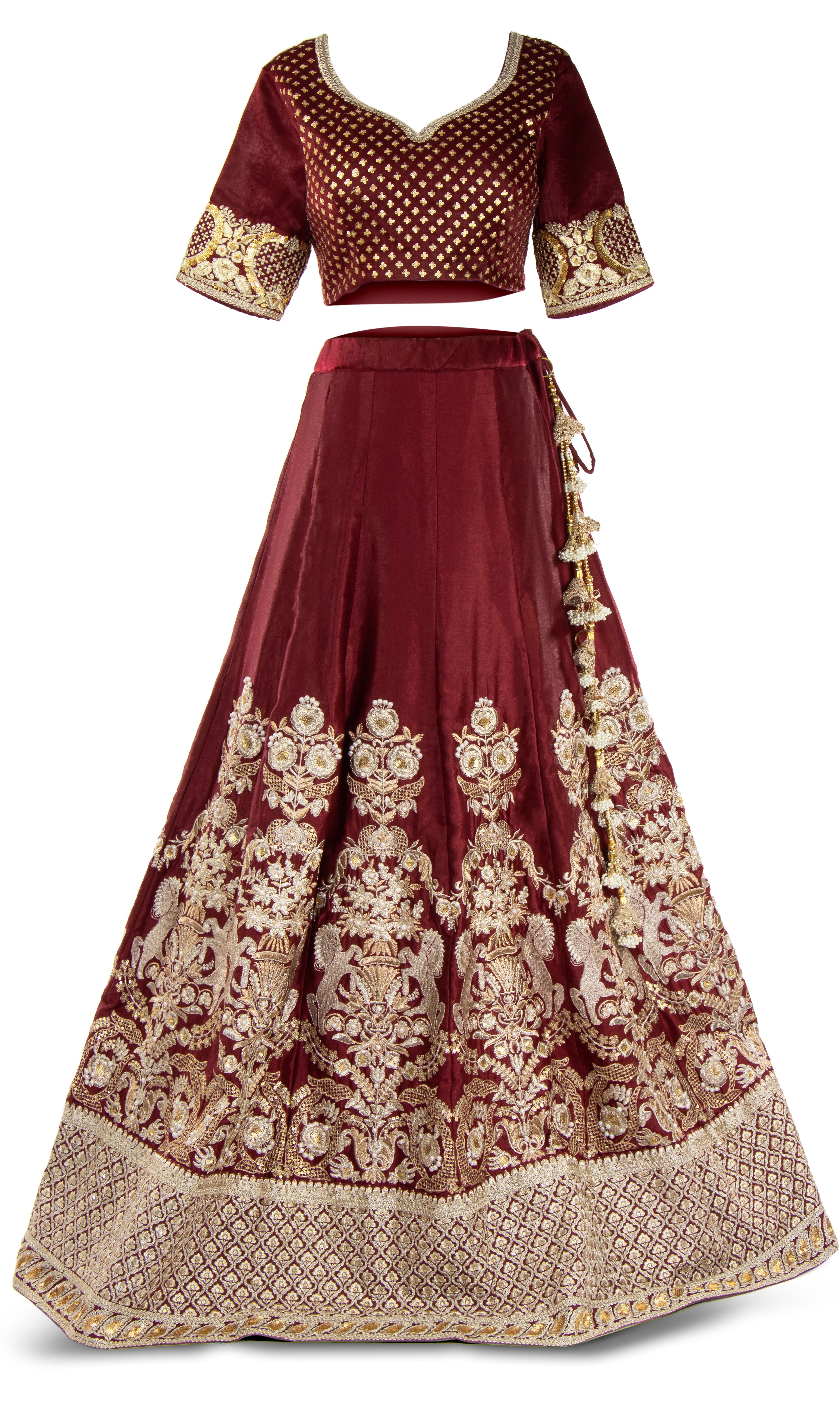 velvet top with maroon skirt adorned with the most regal gold embroidery