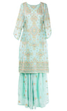Pastel palazzo suit baby blue tunic with a pastel floral pattern glittering with gold. 