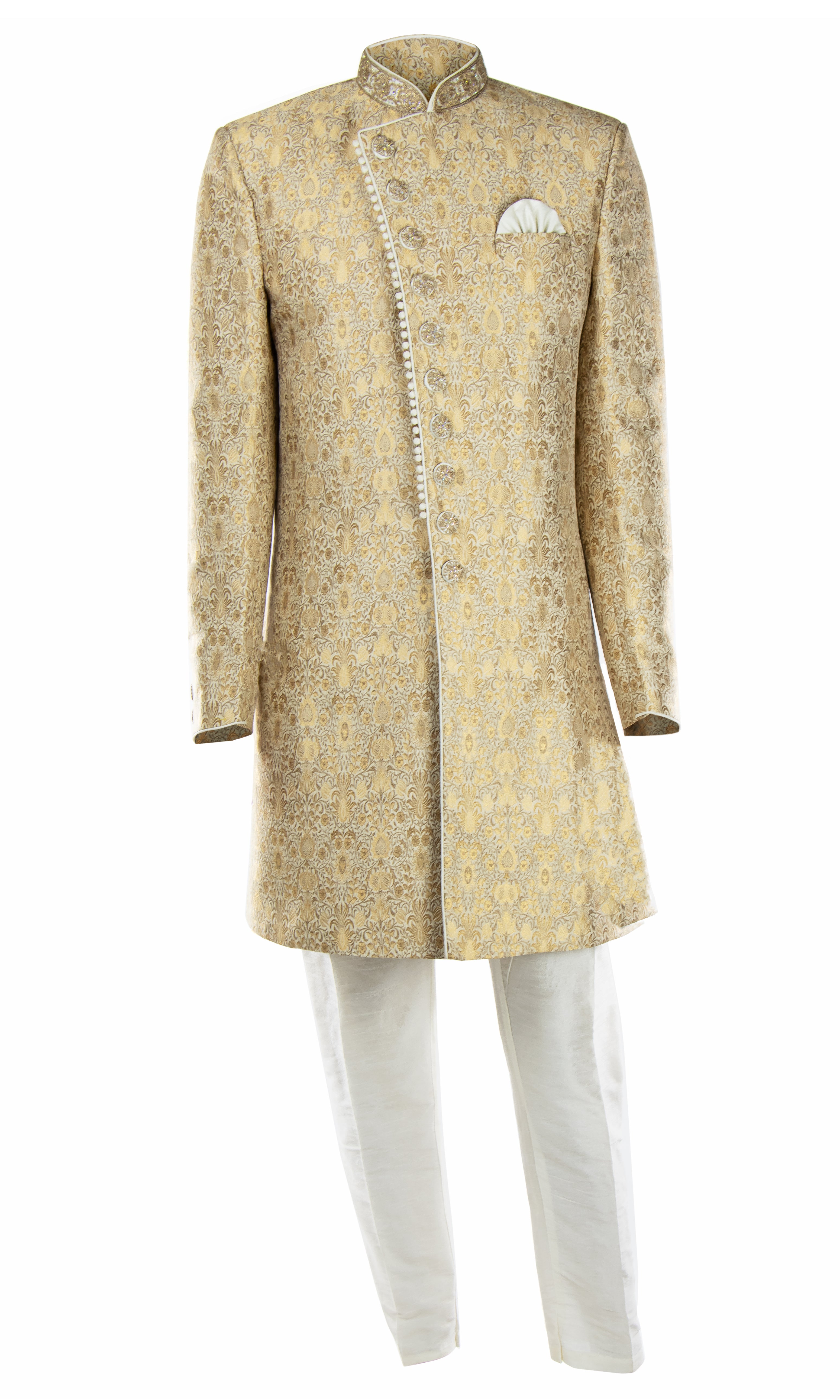 Gold silk Sherwani features an elegant jacquard foliage pattern and an asymmetrical button closure.This Sherwani will look just as good paired with your own tailored dress pants.