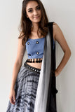 The jean blouse is also embroidered with fun mirror work through out and has hanging black tassels at the bottom!