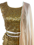 Gold lehenga with a stunning pale pink dupatta with pearls and gold stones around the border. pair with matching blouse.