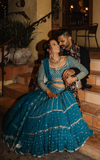 3-piece blue, designer lehenga with shimmering embroidery by Vvani by Vani Vats with shimmering embroidery
