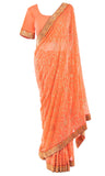 Pre-stitched peach classic Saree, coral blouse with gold thread and beading all over.