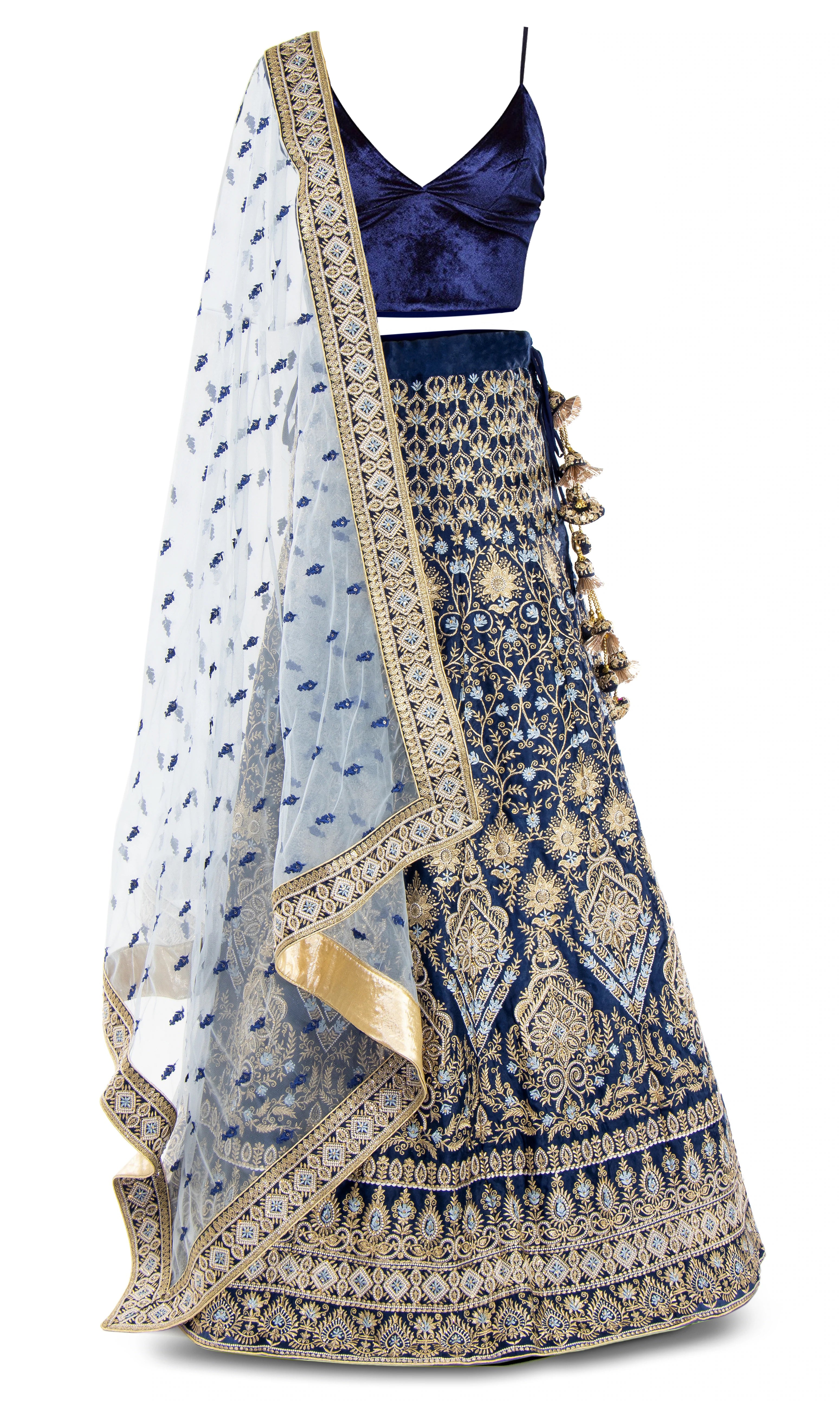 Navy top garnished with elegant gold threadwork and crystals. Pair with matching white net dupatta.
