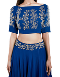 Royal blue 3-piece lehenga by Divya Kanakia with sequins & glass pipes embroidery. Paired with a matching blouse & dupatta.