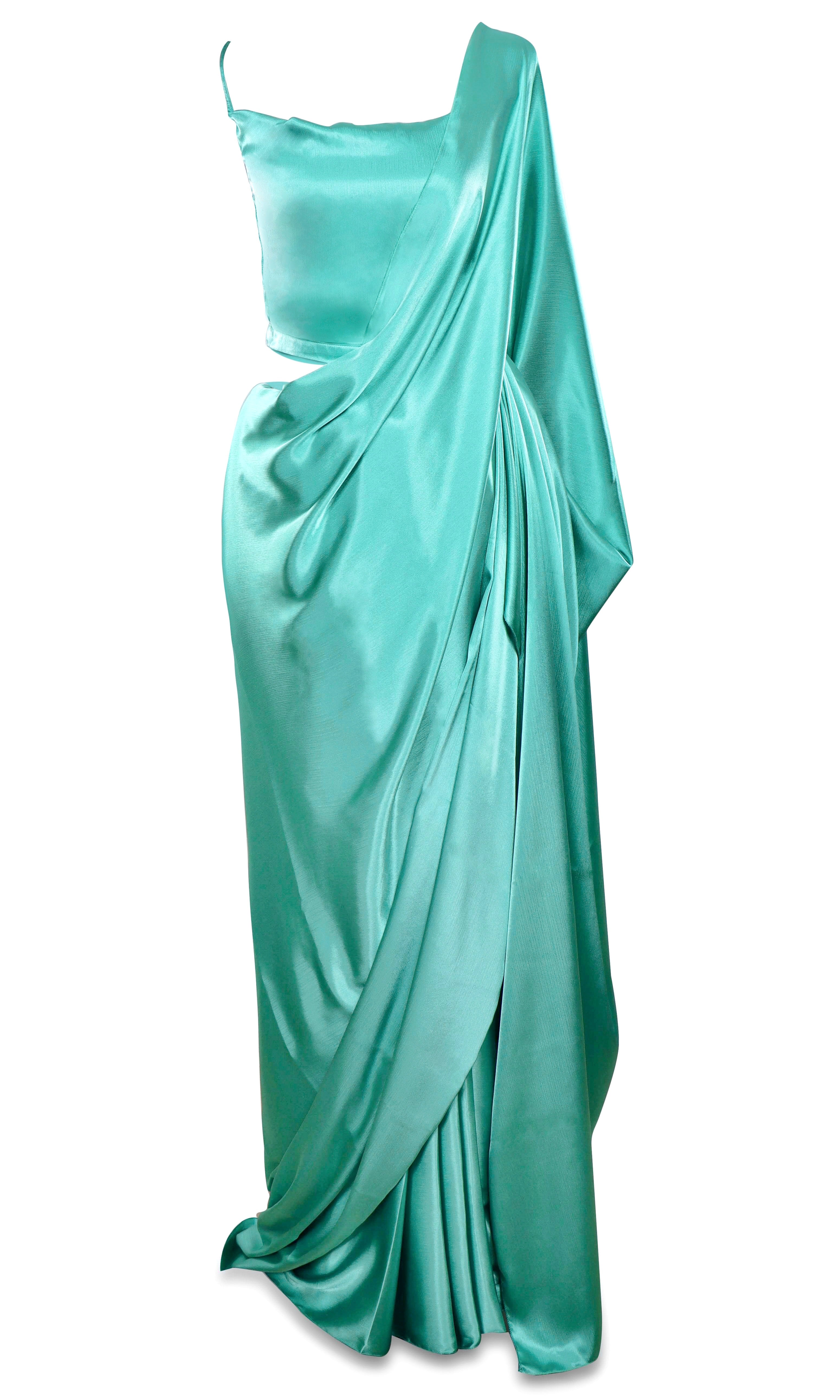 Pre-stitched, pre-pleated aqua blue silk saree comes with a Matching petticoat