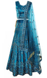 Teal Blue Lehenga Made out of silk, blue thread work and champagne gold sequins, and net dupatta.