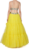Bright yellow designer lehenga by Preeti S Kapoor with silver sequins embroidery, matching blouse & tulle dupatta.