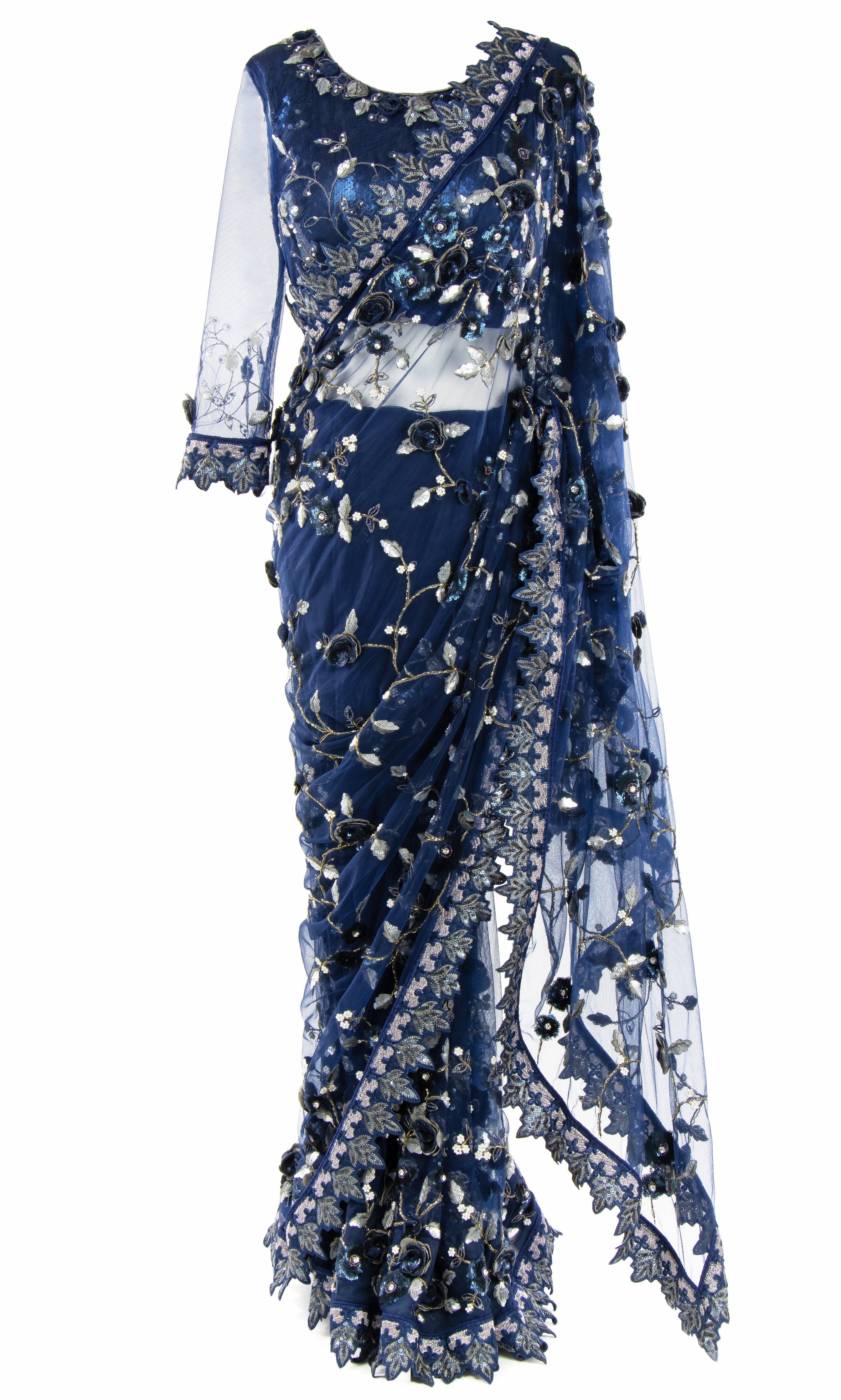 Petticoat Paired with a matching net Saree encrusted with stunning silver beadwork and sequins.