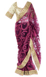 Pre-stitched magenta net saree with lovely embroidery.