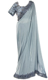 Gray saree short-sleeve gray top is decked out with silver stones and beads, pair with blouse.
