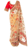 Pre-stitched peach net Saree with Red silk blouse that is elevated with gold embroidery and a key-hole back.