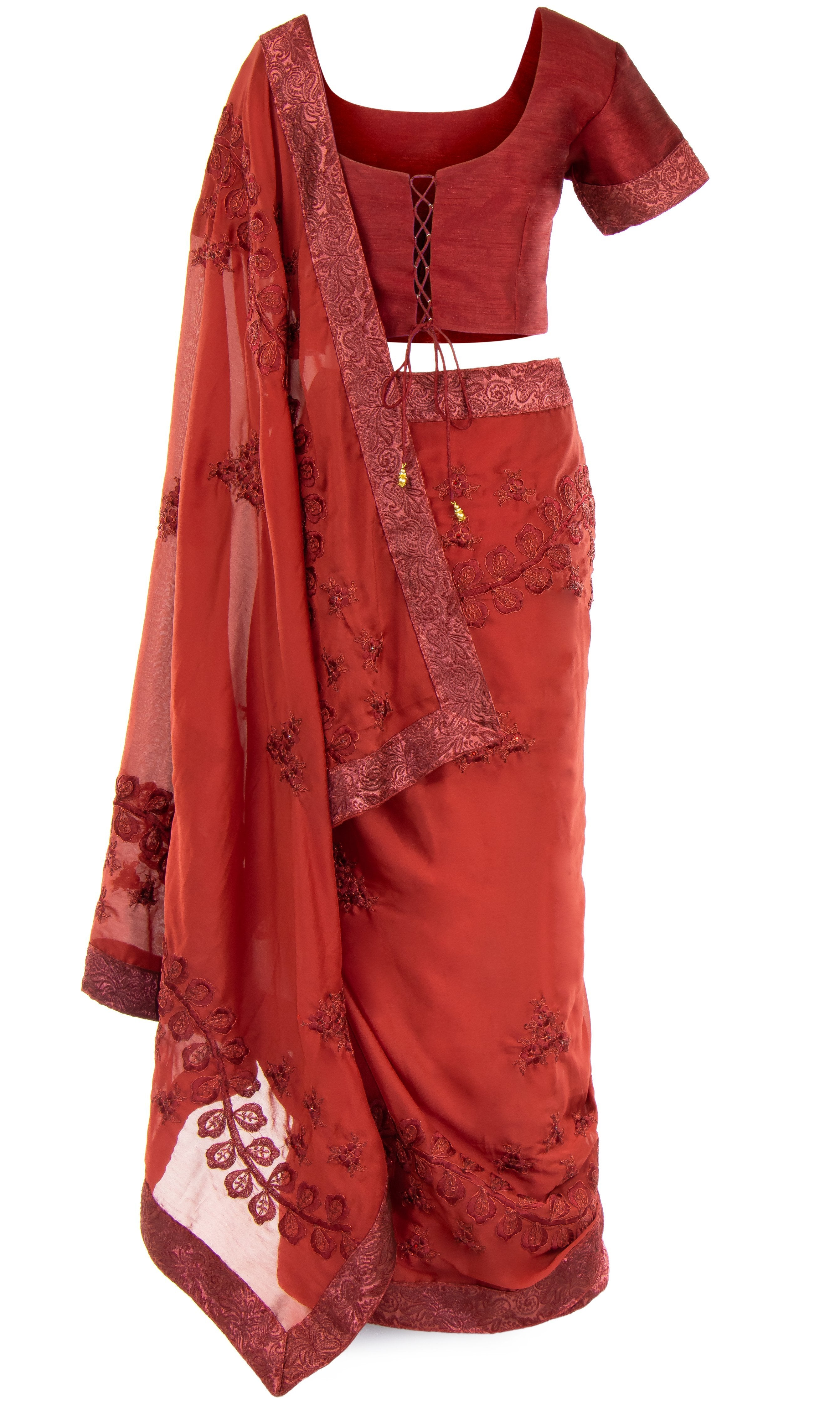 Burgundy Saree with embroidered classic top & has a gorgeous paisley border. Paired with Matching petticoat